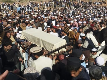 Relatives and local residents carry the coffin of a student, who drowned after a boat capsized in Tanda Dam, during a funeral in Kohat district of northern Khyber Pakhtunkhwa province, on Jan 30, 2023.