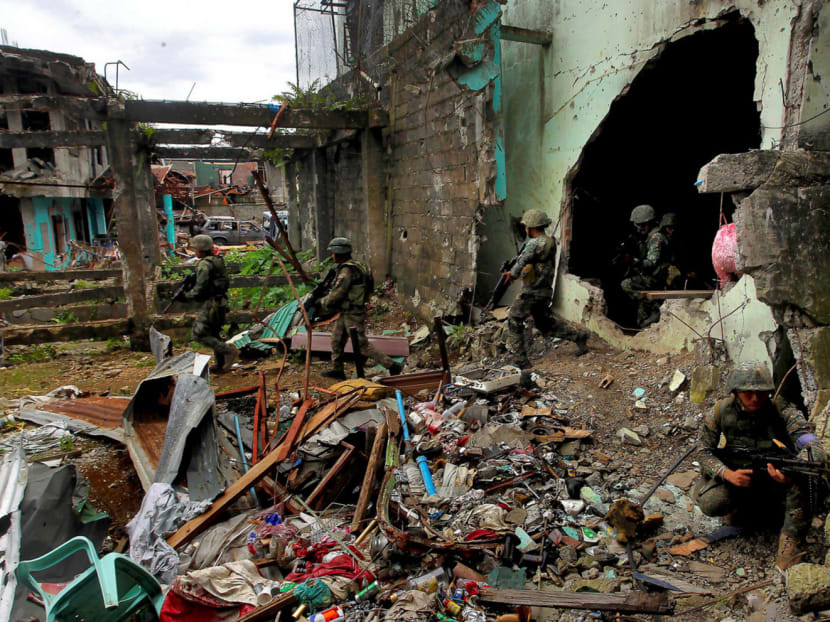 In the once-bustling city of Marawi, the rubble-strewn streets are practically empty, except for scores of heavily armed soldiers. Photo: Reuters