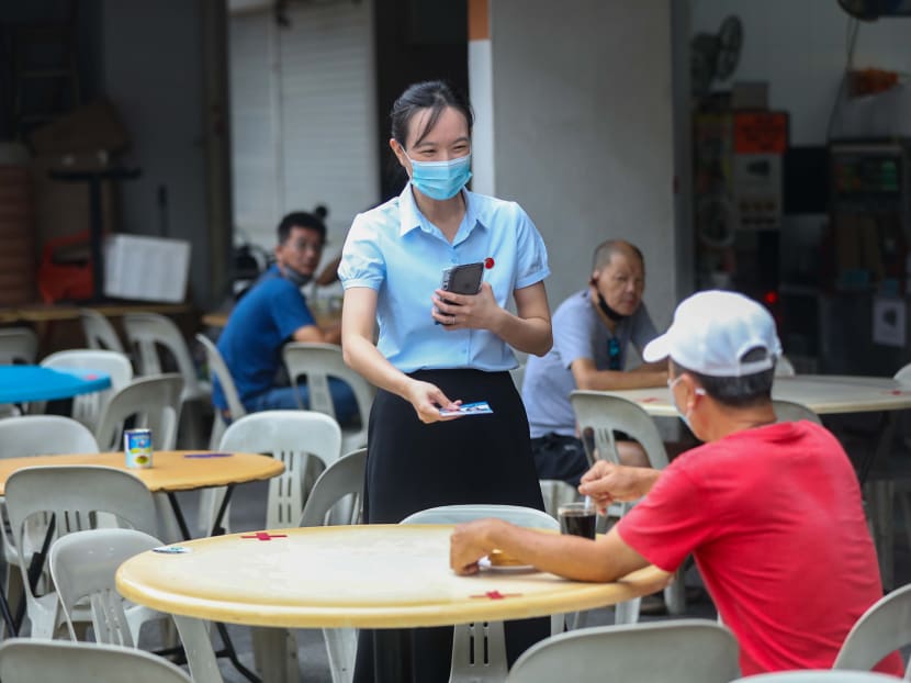 The Workers' Party's Ms Nicole Seah meeting residents in Bedok North during a walkabout with the party’s East Coast GRC team on July 1, 2020.