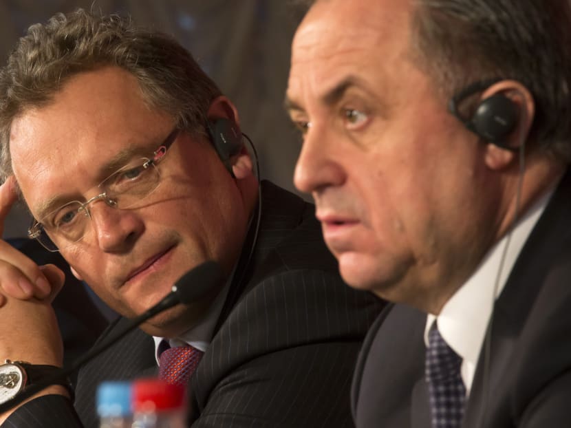 FIFA Secretary General Jerome Valcke, left, and Russian Sports Minister Vitaly Mutko attend a press conference in St.Petersburg, Russia, Monday, Feb 16, 2015. Photo: AP