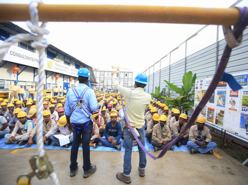 A workplace safety and health officer conducting training for 700 workers on the first day of the SCAL Safety Promotion Campaign — Work at High Awareness training at Bukit Batok West Ave 6. Minister of State (Manpower) Sam Tan said the construction industry remained the biggest contributor to workplace fatalities last 

year. TODAY File Photo