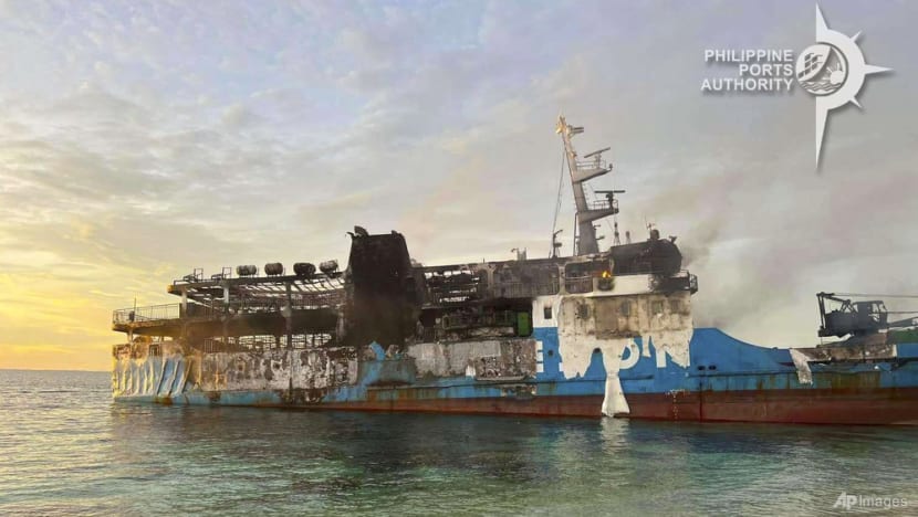 Death scene in burned Filipino ferry moves rescuers to tears
