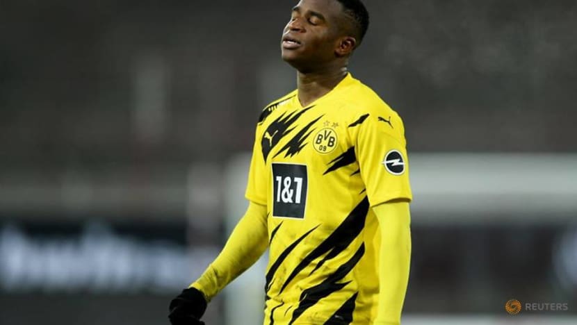 Moukoko becomes youngest Bundesliga scorer but Dortmund ...