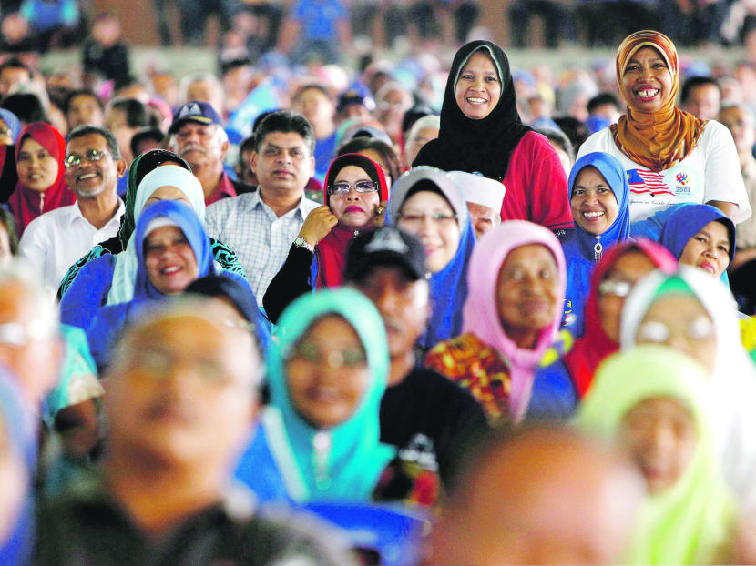 People react to a speech by Malaysian Prime Minister Najib Razak during an election campaign rally in Kuala Kangsar, Perak state, Malaysia, Friday, April 26, 2013. Photo: AP