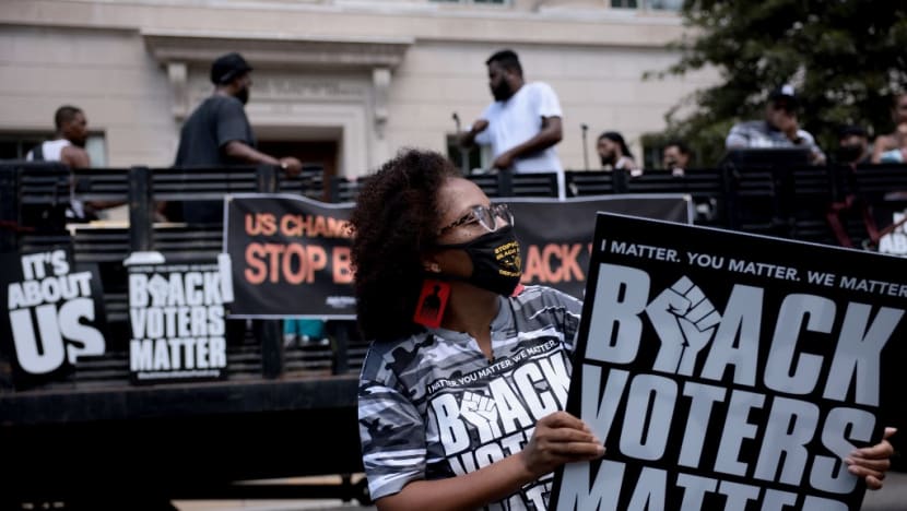 Thousands protest curbs on minority voting rights in US Thousands protest curbs on minority voting rights in US