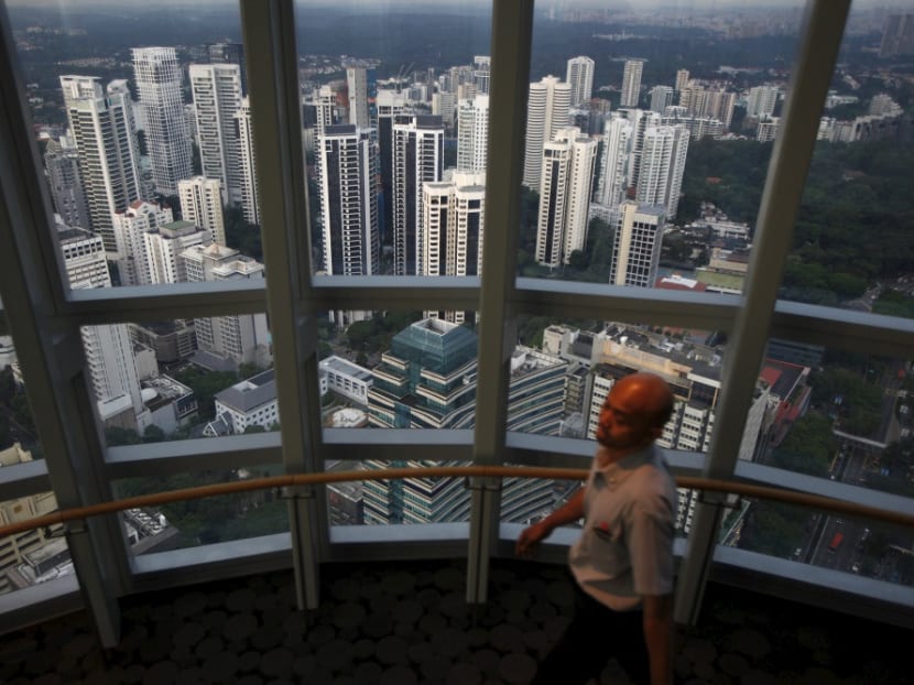 Singapore’s prosperity and strong dollar is a ‘pull’ factor for many Malaysians, who seek greener pastures in the island republic. Photo: Reuters