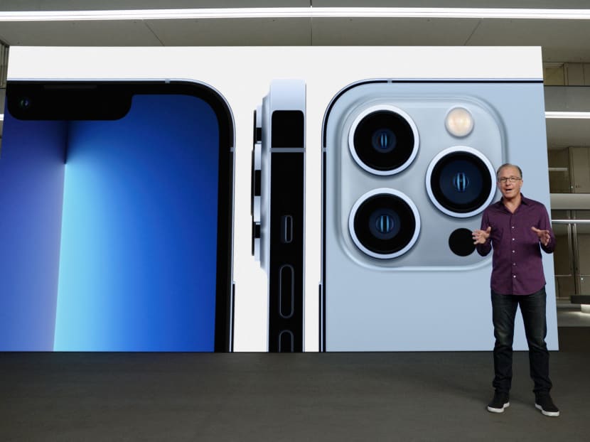 Apple's senior vice president of Worldwide Marketing Greg Joswiak talking about the new iPhone 13 Pro during a special Apple event, as seen in this still image from the keynote video. Apple CEO Tim Cook strode through a slickly produced video Tuesday to launch a new iPhone, with few hints of the exceptional string of troubles facing his company including policy reversals, a spyware attack and legal fights. Apple's senior vice president of Worldwide Marketing Greg Joswiak talking about the new iPhone 13 Pro during a special Apple event, as seen in this still image from the keynote video. Apple CEO Tim Cook strode through a slickly produced video Tuesday to launch a new iPhone, with few hints of the exceptional string of troubles facing his company including policy reversals, a spyware attack and legal fights.