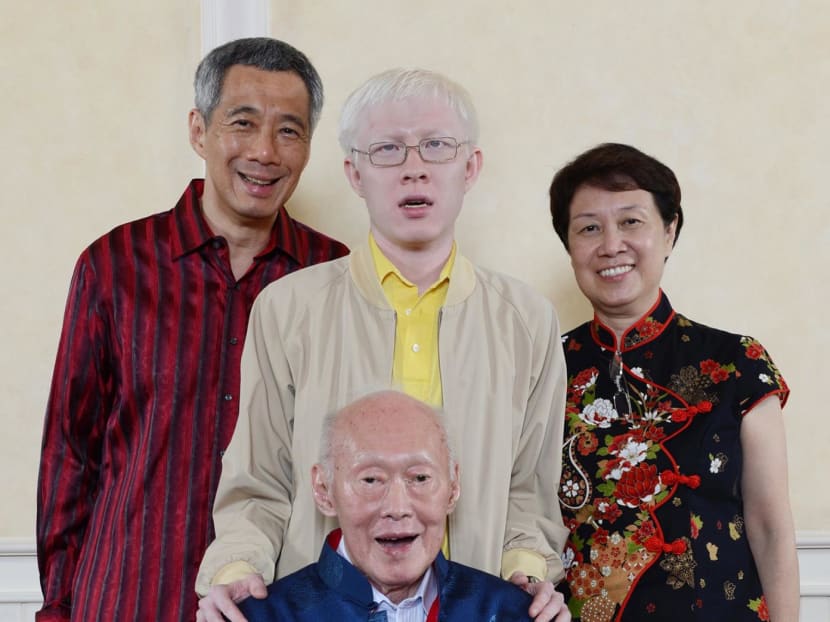 Prime Minister Lee Hsien Loong posted this family photo taken two Chinese New Years ago in 2013 on his Facebook today (Feb 21). Photo: Lee Hsien Loong/ Facebook