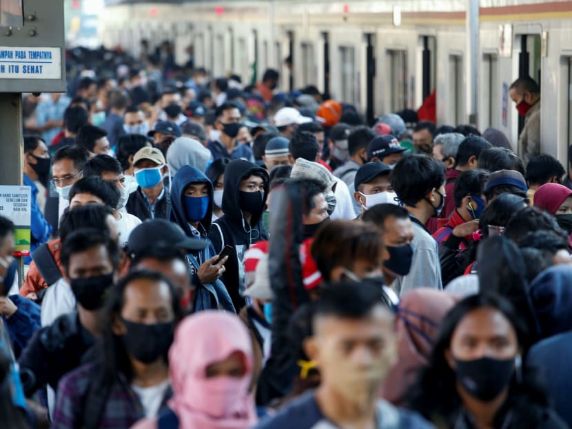 Commuters during rush hour at a train station in Jakarta on July 6, 2020. A 2015 survey of 1,200 people across all 34 provinces found that 84.9 per cent of Indonesians supported capital punishment, especially for drug traffickers.