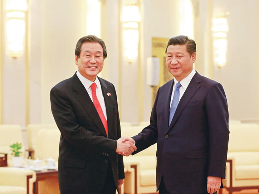 Gallery: Xi, Abe likely to meet in carefully negotiated display of goodwill