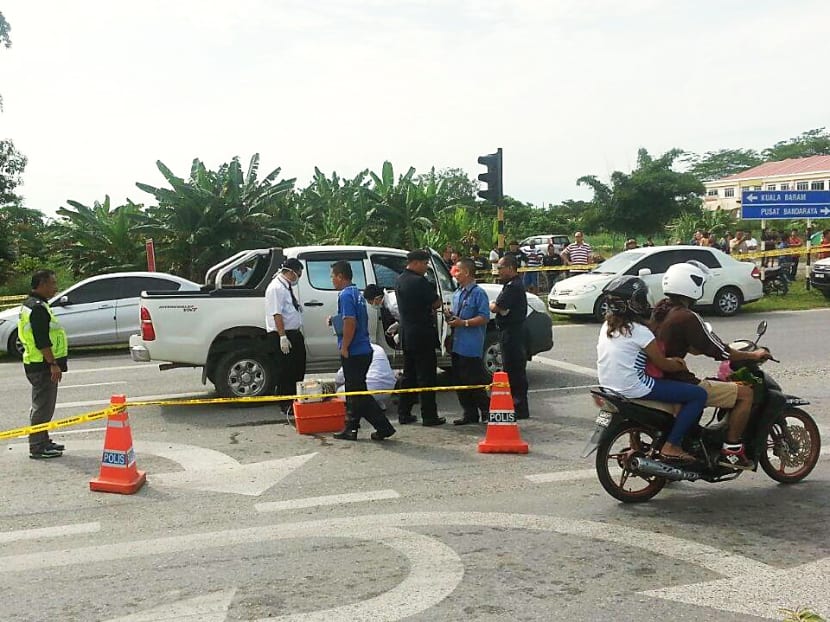 The scene of the drive-by shooting in Miri in which PKR member Bill Kayong was murdered. Photo: Facebook