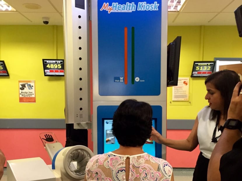 At the kiosk, patients have their blood pressure, height and weight taken, and their conditions assessed via a customised questionnaire. Photo: Tan Weizhen
