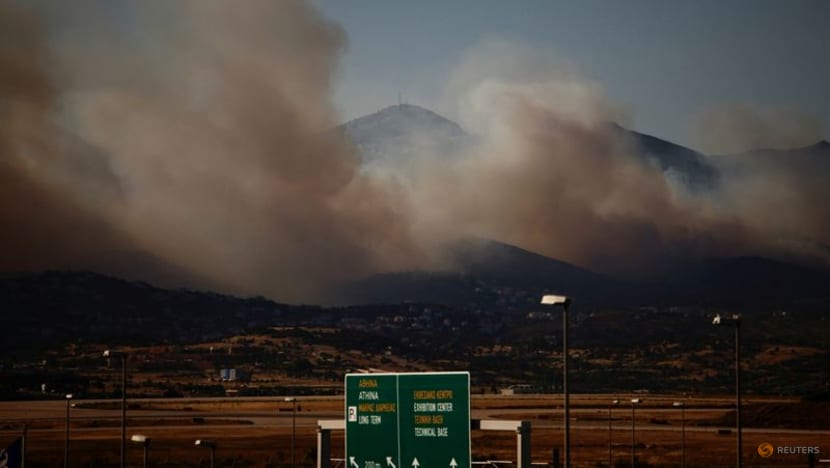 Greek wildfire rages near Athens; homes, hospital evacuated Greek wildfire rages near Athens; homes, hospital evacuated