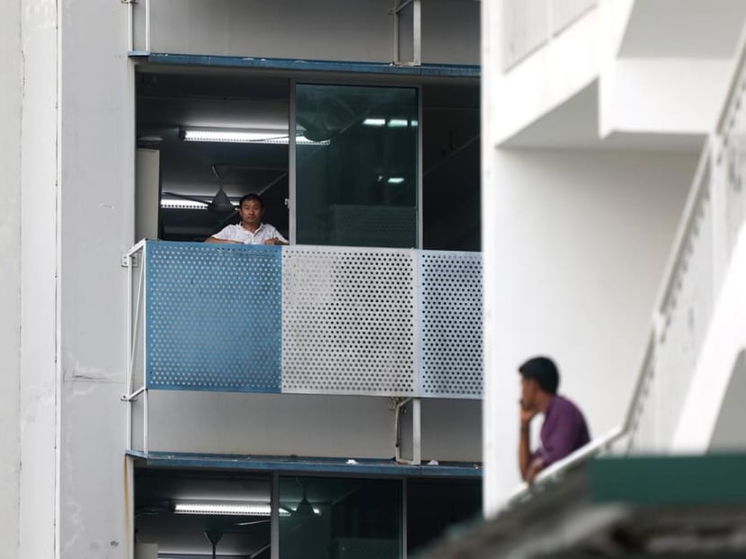 Workers at the Sungei Tengah Lodge. Workers at the Sungei Tengah Lodge.