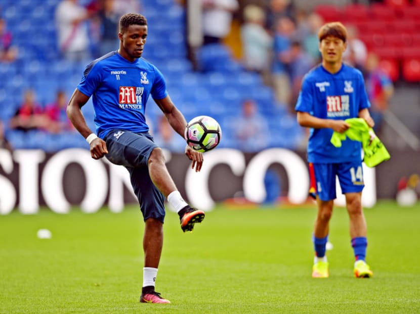 Wilfried Zaha warming up for Crystal Palace against Bournemouth at Selhurst Park at the weekend.  Palace have brushed off a multi-million-dollar offer for Zaha from Tottenham Hotspur. Photo: Reuters