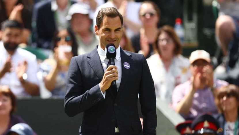 Federer hints at Wimbledon comeback on surprise visit