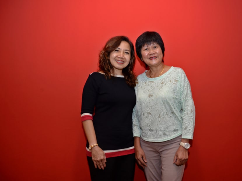 Mrs Tina Goh (left) and Mrs Judy Kong are among the 10 women featured in Born A Hero, which marks the SAF’s 50th anniversary. Photo: Robin Choo