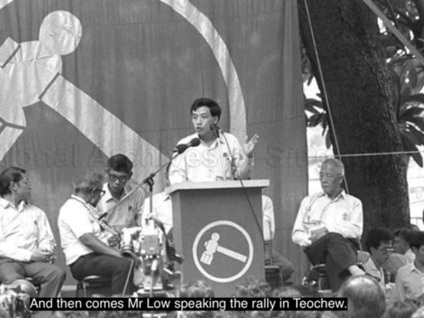 A scene in a documentary showing Mr Low Thia Khiang speaking at a podium and campaigning for the Workers' Party. 