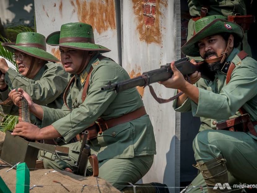 Wooden swords and replica rifles: History buffs in Indonesia recreate battles to honour national heroes Wooden swords and replica rifles: History buffs in Indonesia recreate battles to honour national heroes