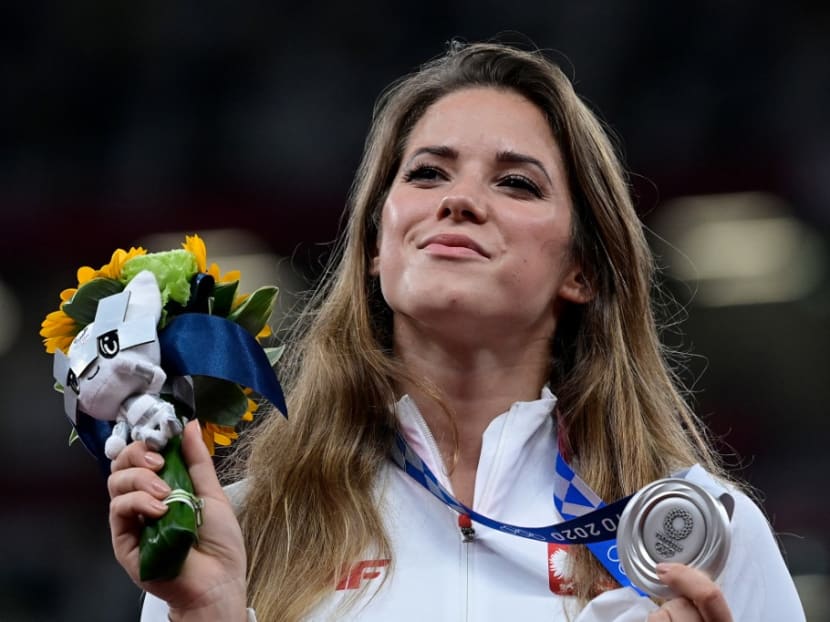 Polish javelin thrower gets Olympic silver medal returned after auctioning it off to help with infant’s surgery Polish javelin thrower gets Olympic silver medal returned after auctioning it off to help with infant’s surgery