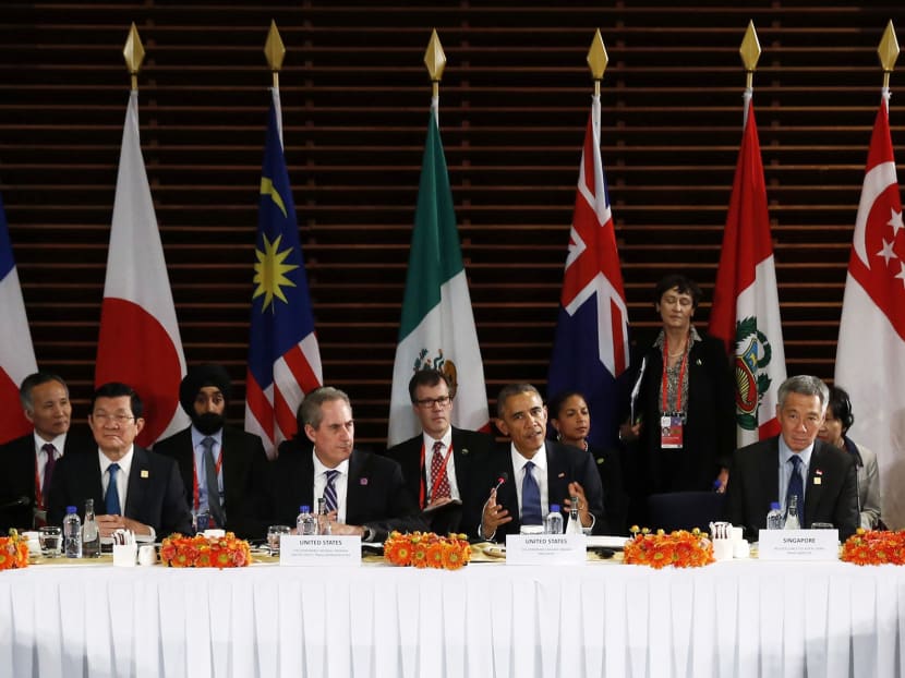Then US President Barack Obama (centre) meets with the leaders of the Trans-Pacific Partnership (TPP) countries in Beijing November 10, 2014. Reuters file photo