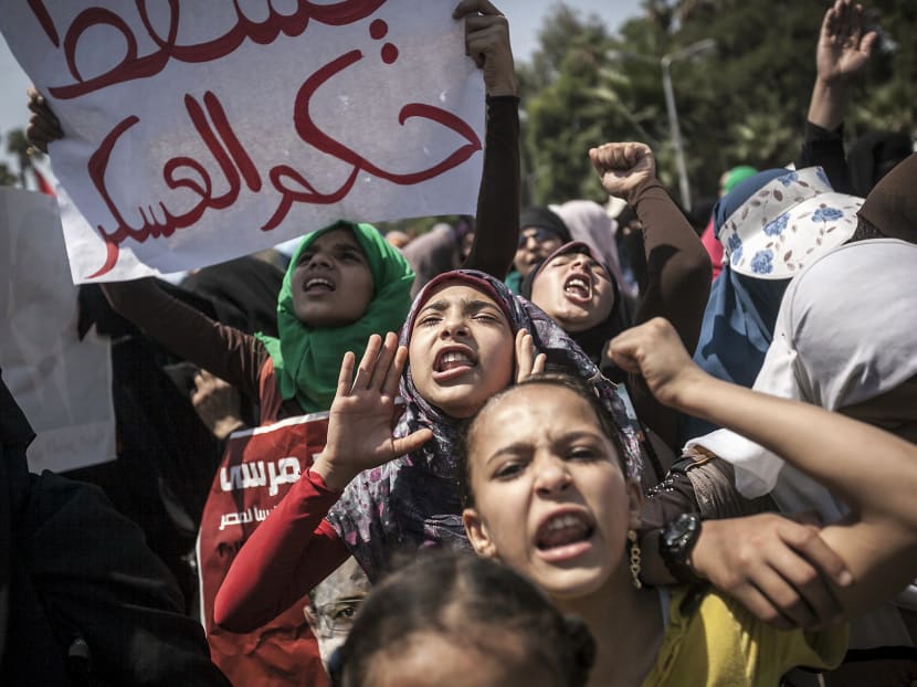 Supporters of the Muslim Brotherhood during a demonstration against the ouster of Egypt's president at Cairo University in Giza, Egypt, July 5, 2013. Photo: The New York Times