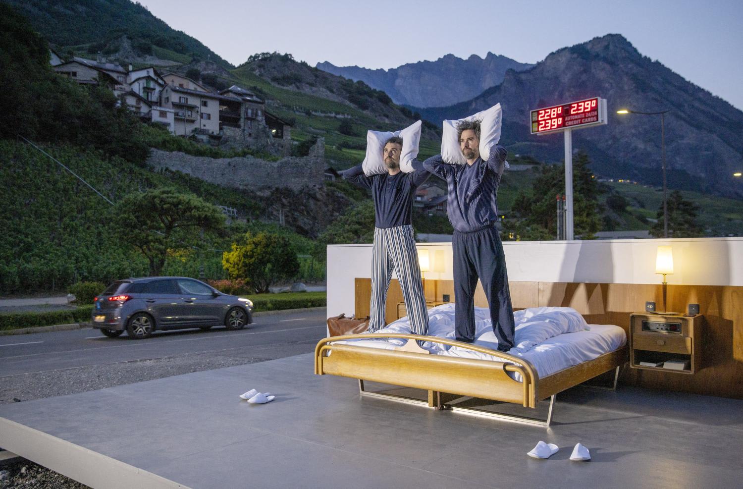 Swiss artists Frank and Patrik Riklin pose on the bed in the anti-idyllic suite of the Null-Stern-Hotel (Zero-Star-Hotel), offering guests a choice between four open-air rooms in reaction to the world current state after the pandemic, in Saillon, Switzerland June 14, 2022. Swiss artists Frank and Patrik Riklin pose on the bed in the anti-idyllic suite of the Null-Stern-Hotel (Zero-Star-Hotel), offering guests a choice between four open-air rooms in reaction to the world current state after the pandemic, in Saillon, Switzerland June 14, 2022.