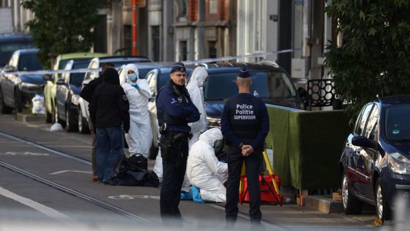 Shaken Swedes start heading home after two fans shot dead in Brussels