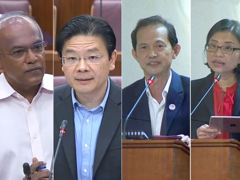 (Left to right) Law and Home Affairs Minister K Shanmugam, Finance Minister Lawrence Wong and Non-Constituency Members of Parliament Leong Mun Wai and Hazel Poa in Parliament on Sept 14, 2021.