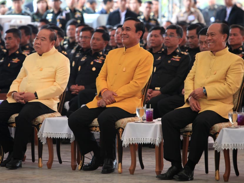 Prime Minister Prayuth Chan o-cha (centre) with Deputy Prime Minister Prawit Wongsuwon (left) and Interior Minister Anupong Paojinda (right) - both his former housemates - are now trying to win an unavoidable election. Photo: Bangkok Post