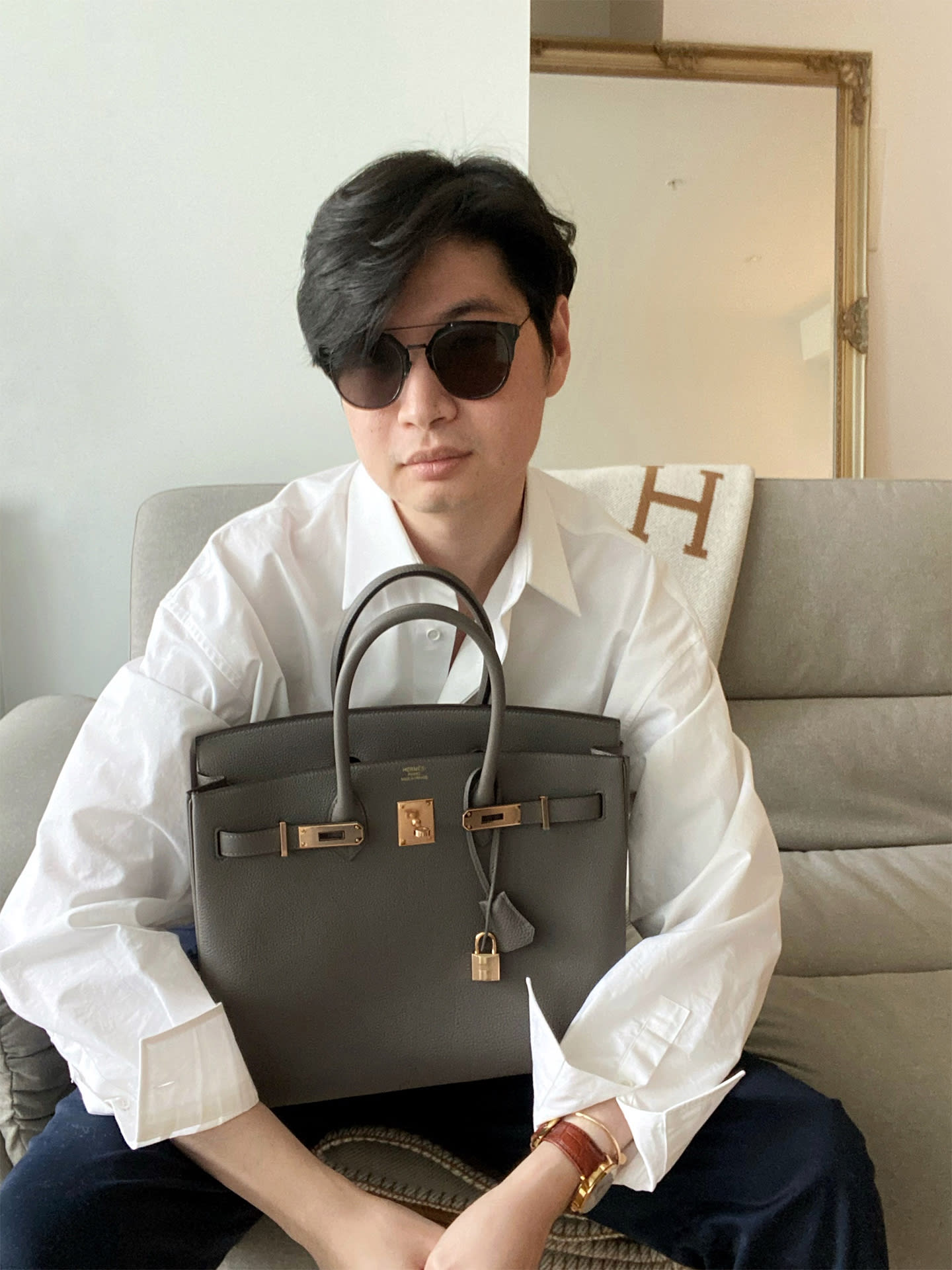Across Asia, why are more men carrying women's handbags? - CNA Luxury