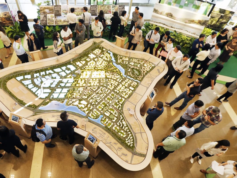 Visitors to the HDB Hub looking at a model of the Tengah masterplan at the launch of a public exhibition to showcase the key planning concepts for Tengah, on Sep 9, 2016.