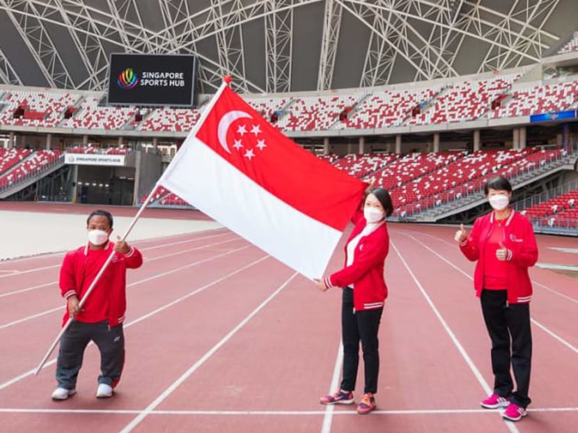 (From left) Minister for Culture, Community and Youth Edwin Tong, flagbearer Muhammad Diroy Noordin, chef de mission Shirley Low and Singapore National Paralympic Council chairperson Teo-Koh Sock Miang.