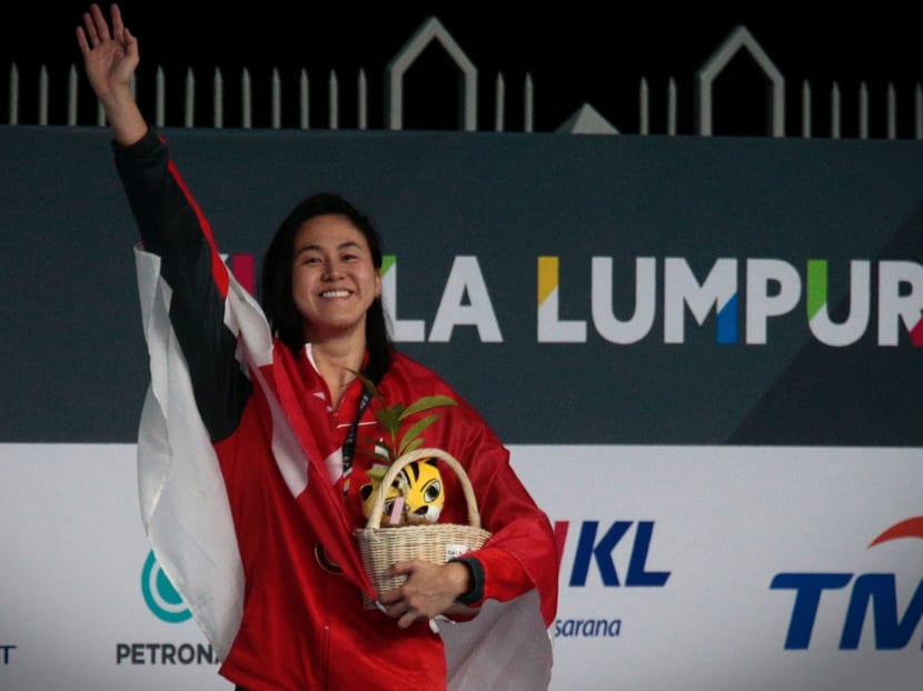 Quah Ting Wen with her second gold medal of the evening - the 50m butterfly. Photo: Jason Quah/TODAY