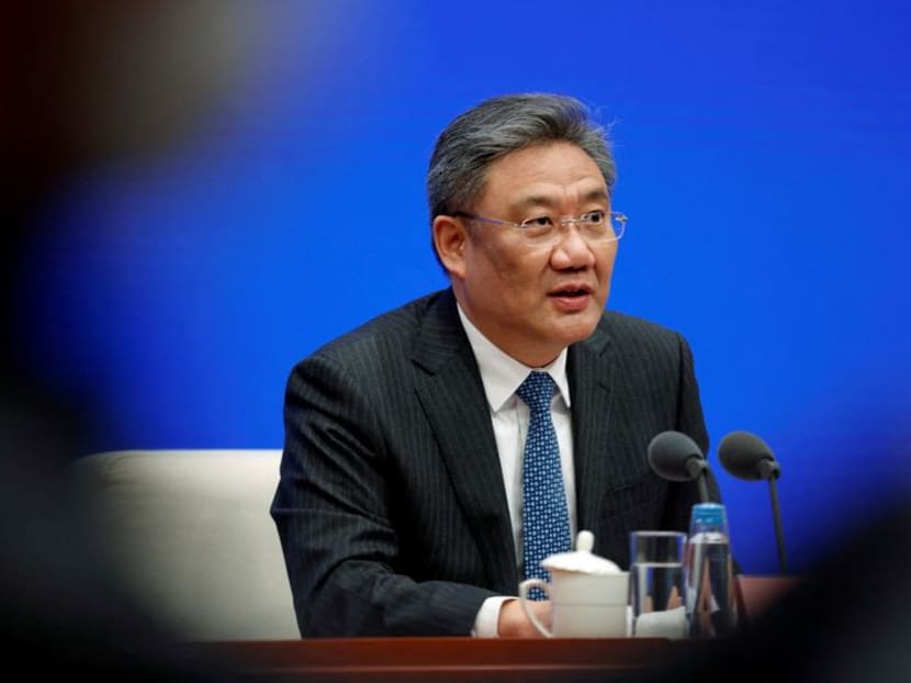 FILE PHOTO: Chinese Commerce Minister Wang Wentao speaks at a news conference in Beijing, China March 2, 2023. REUTERS/Florence Lo/File Photo