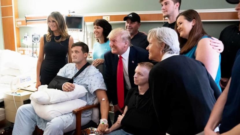 Trump consoles shooting victims, faces new criticism Trump consoles shooting victims, faces new criticism