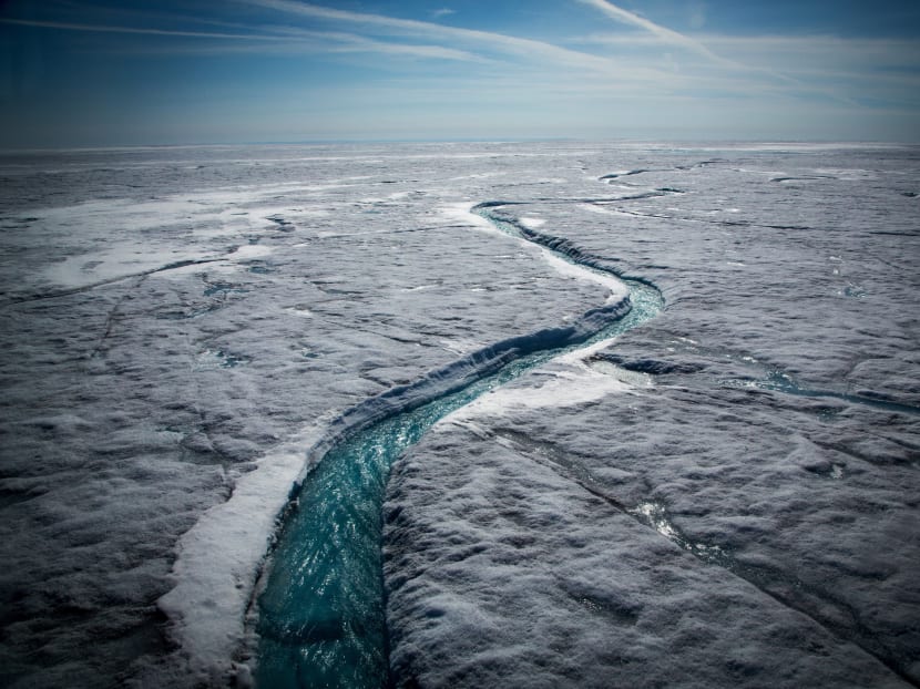 Meltwater flows through the Greenland ice sheet, one of the biggest and fastest-melting chunks of ice on Earth.