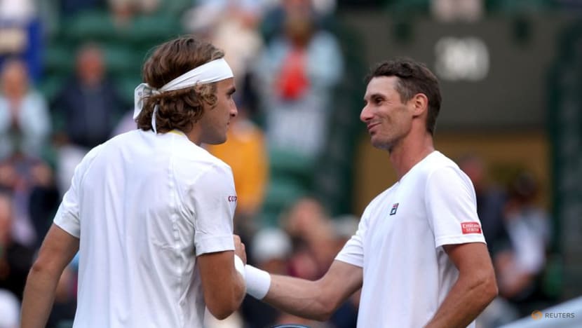 Tsitsipas wriggles out of trouble to reach Wimbledon second round Tsitsipas wriggles out of trouble to reach Wimbledon second round