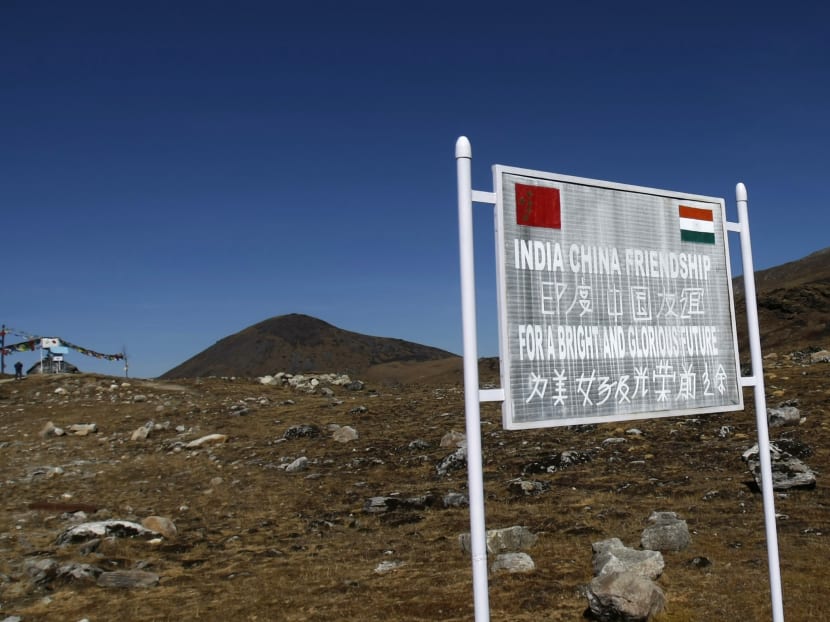 A signboard is seen from the Indian side of the Indo-China border at Bumla, in the northeastern Indian state of Arunachal Pradesh. Reuters file photo
