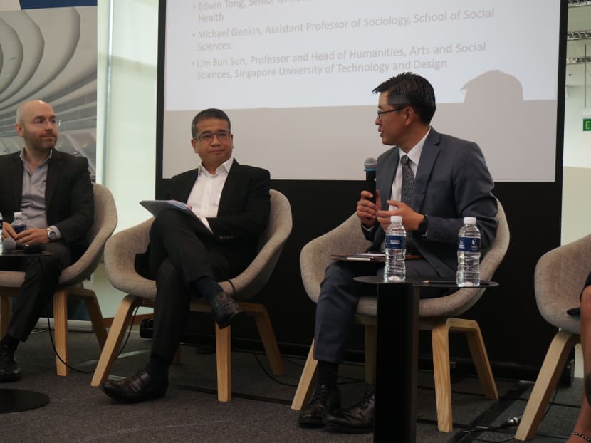 Mr Edwin Tong (centre), Senior Minister of State for Law, speaking at a forum, Truth and Lies: Trust in Times of Information Disorder, held at the Singapore Management University.