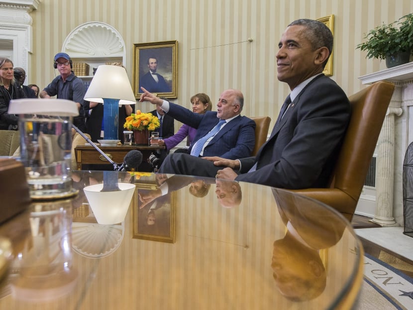 President Barack Obama at a meeting with Iraqi Prime Minister Haider Abadi, center, in The Oval Office at the White House in Washington, April 14, 2015. Photo: The New York Times