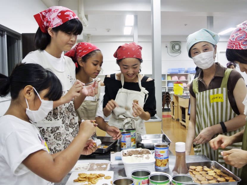 Since the launch of the first makeshift cafe for poor children in Tokyo in 2012, the number of children’s cafes has sharply increased to about 500. Photo: Kyodo News