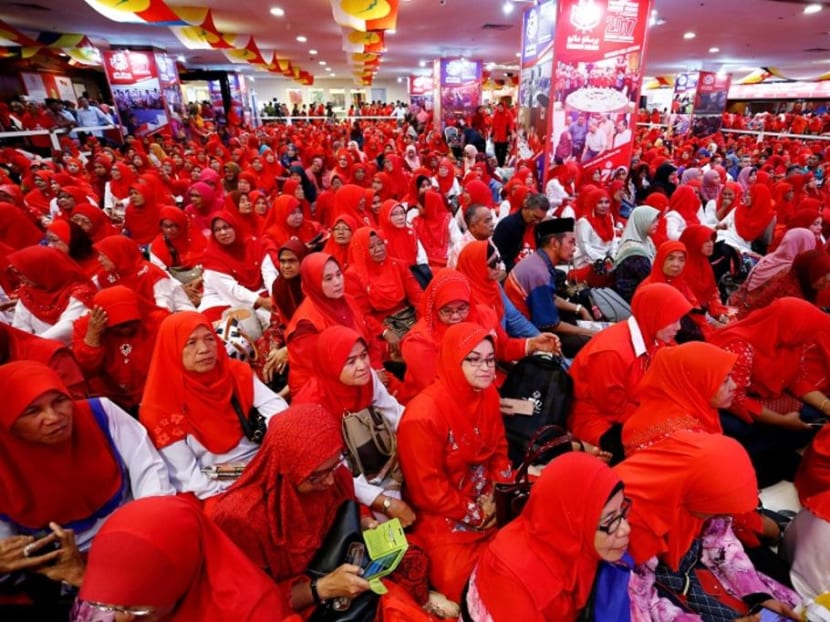 Members of the United Malays National Organisation (Umno) listen to a speech by then president Najib Razak during its general assembly in Kuala Lumpur last year.