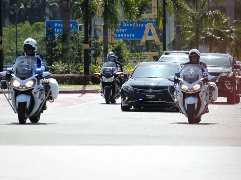 A vehicle ferrying Dr Mahathir Mohamad arrives at Istana Negara for an audience with the Malaysian king, February 27, 2020.