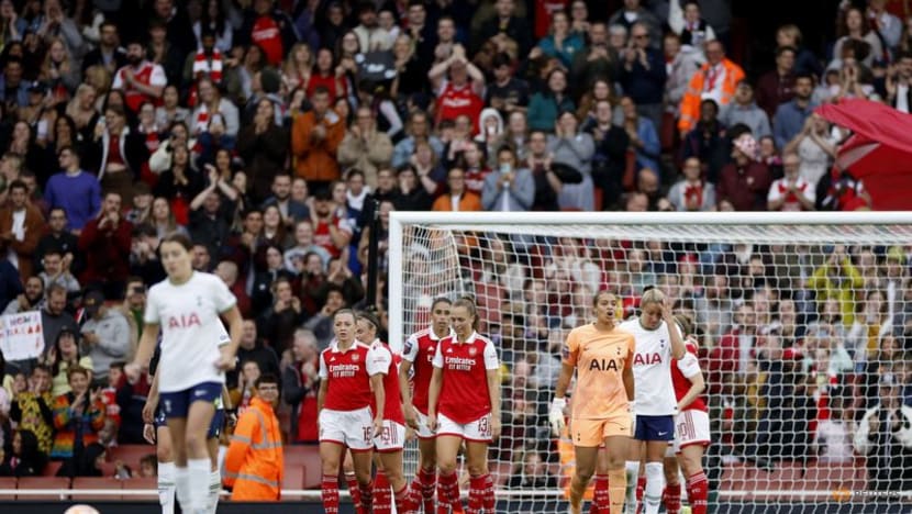 Record WSL crowd sees Arsenal cruise to 4-0 win over Spurs Record WSL crowd sees Arsenal cruise to 4-0 win over Spurs