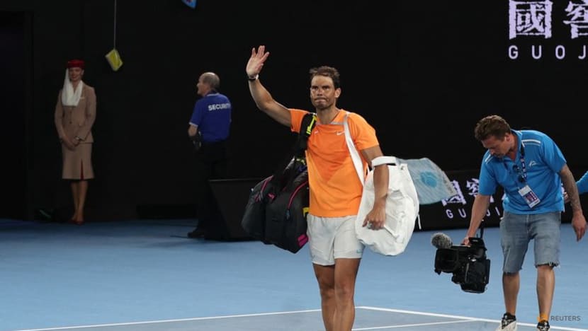 Injured defending champion Nadal bows out of Australian Open Injured defending champion Nadal bows out of Australian Open