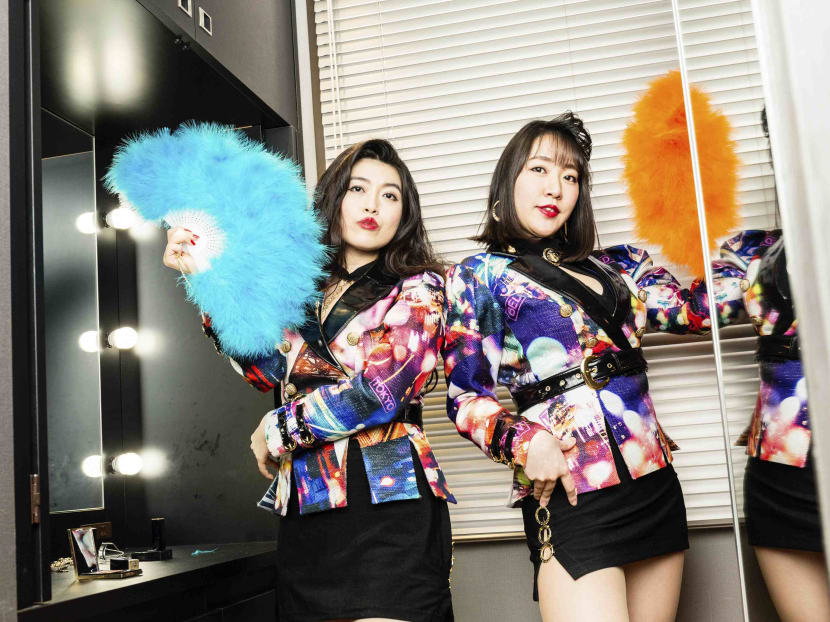 Vocalist Kaori Masukodera (left) and guitarist Mai Chusonji of the duo Bed In, in Tokyo. Bed In’s garish outfits and bubbly music are part of a nostalgic reappreciation of Japan’s 1980s economic boom.