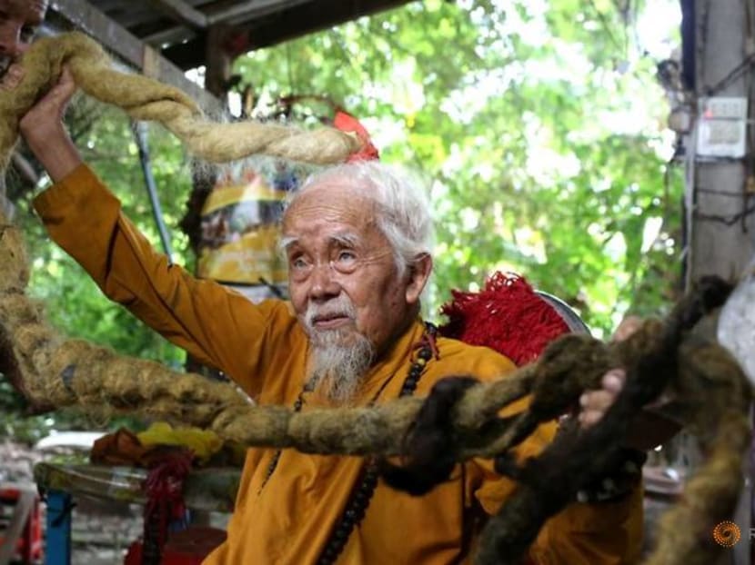 Vietnamese man with five-metre hair says lifelong grow-out is divine calling