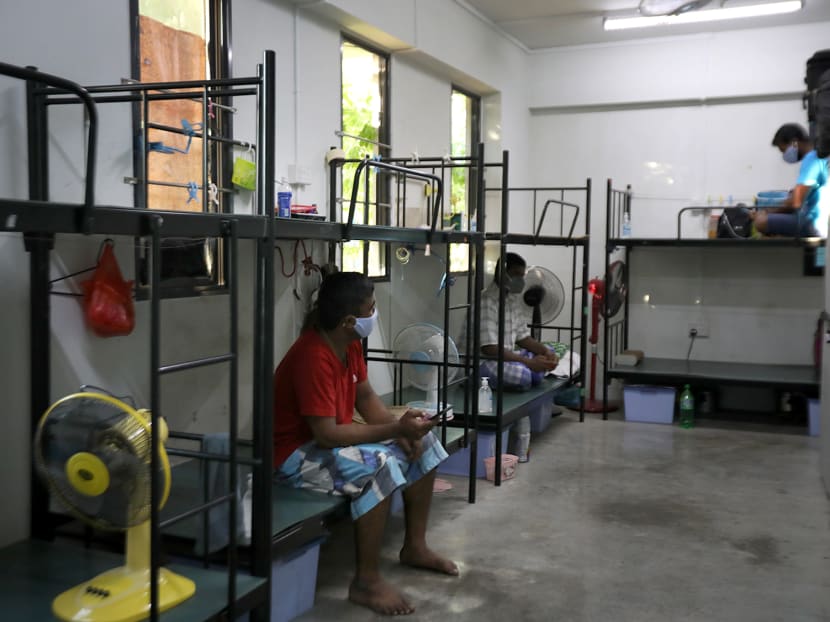 Foreign workers in their room at Westlite Papan dormitory on April 21, 2020. The room has three occupants now, down from eight, after workers in essential services were moved out.