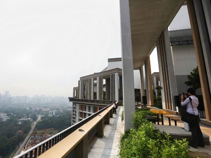 A view from the 47th-floor roof garden of a public housing block at Skyville@Dawson near the Queenstown district. A view from the 47th-floor roof garden of a public housing block at Skyville@Dawson near the Queenstown district.